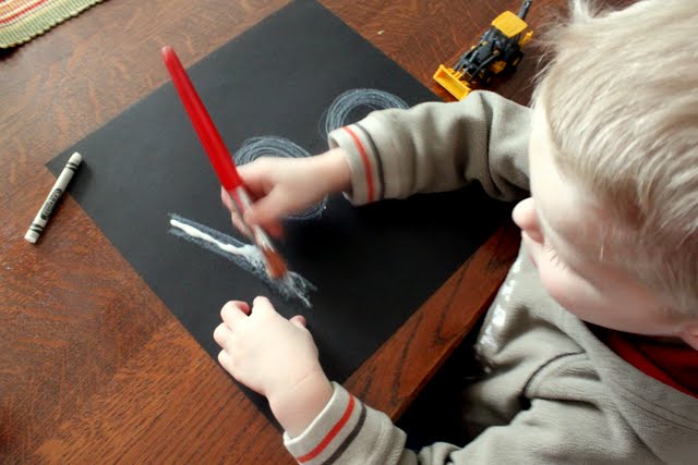 Paint glue over drawing for sand sensory play to stick to.