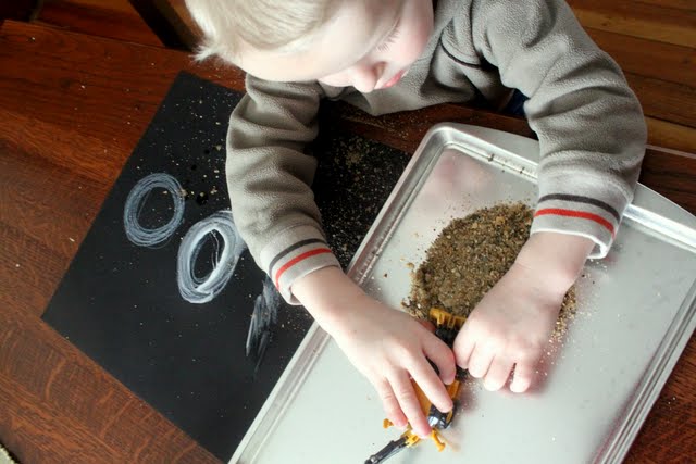 Take sand sensory play to a new level and create a number 100 art project or any other picture you want with your toddler or preschoolers!