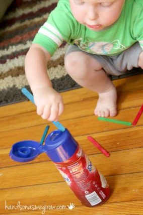 A fine motor activity to keep toddler busy using a plastic bottle