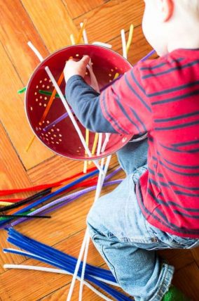 Just pipe cleaners and a colander - such a simple fine motor activity for toddlers to try.
