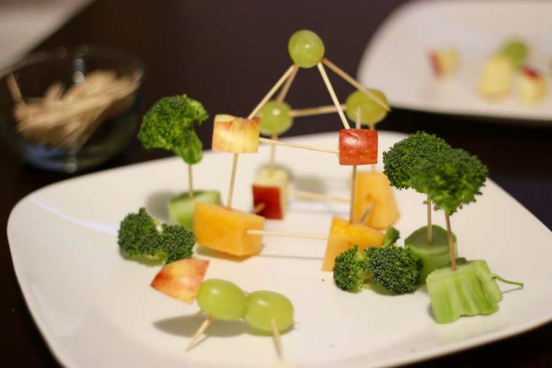 Encourage healthy snacking with fruit and veggie building for kids.