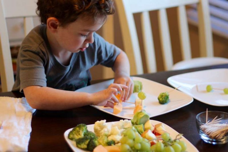 Encourage healthy snacking with fruit and veggie building for kids.