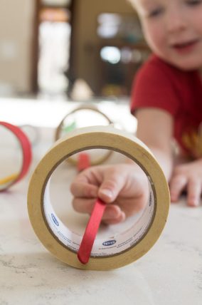 Passing objects through one another... such a simple way to strengthen little hands!