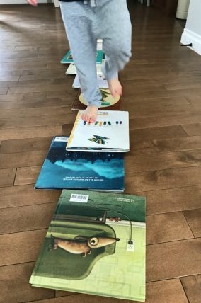 Cute way to bring more fun with books! And uneven book trail with a built-in domino effect