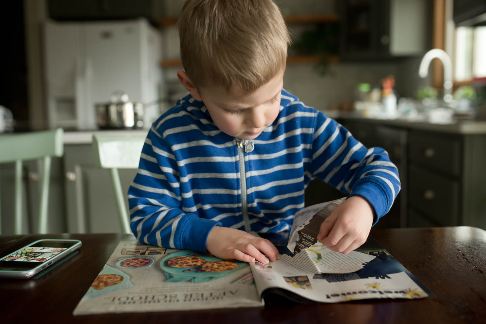 Tearing paper is a great activity to work on their fine motor grasp and control.