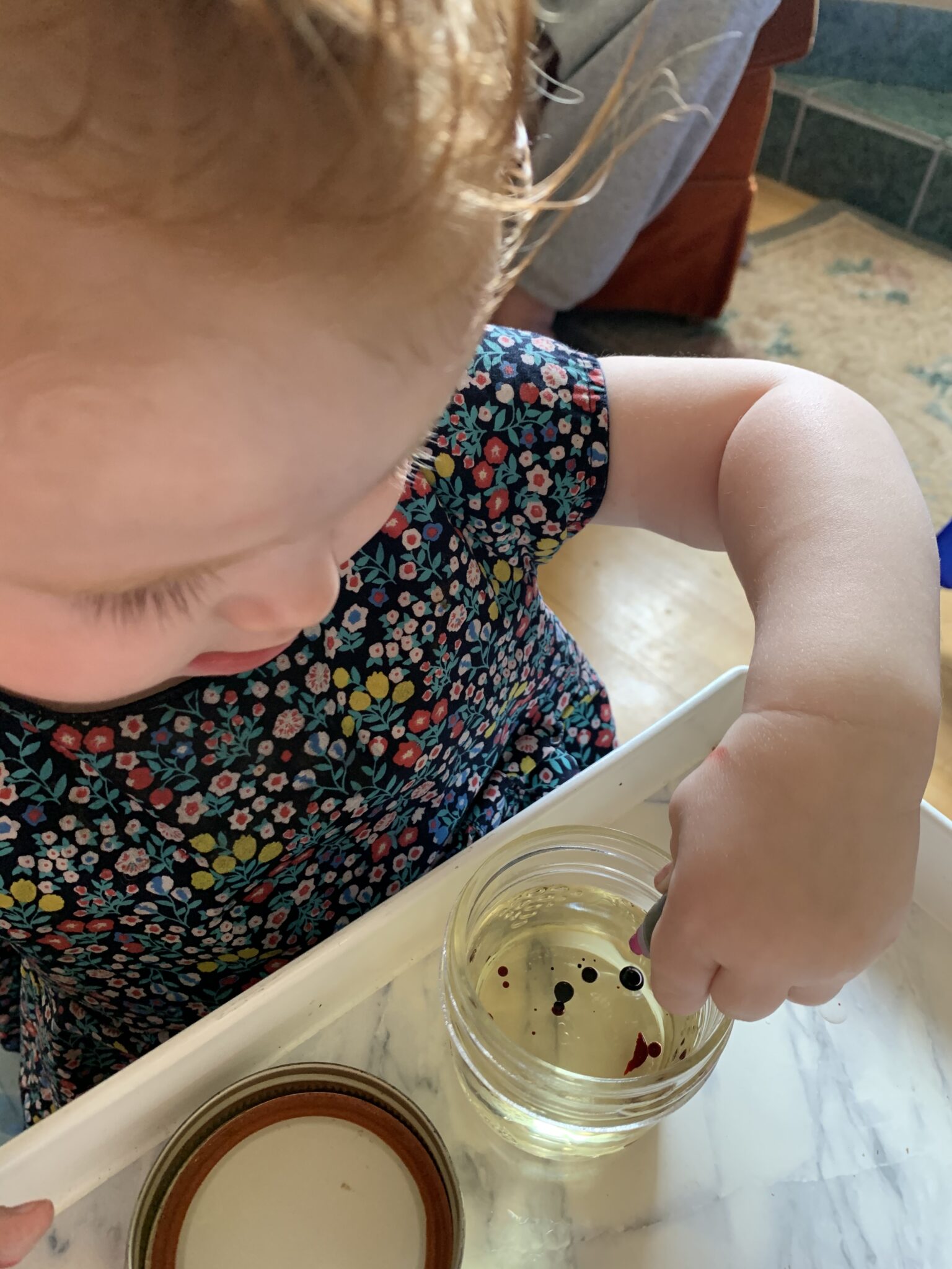 Squeeze food coloring drops into oil jars like little floating planets in the solar system.