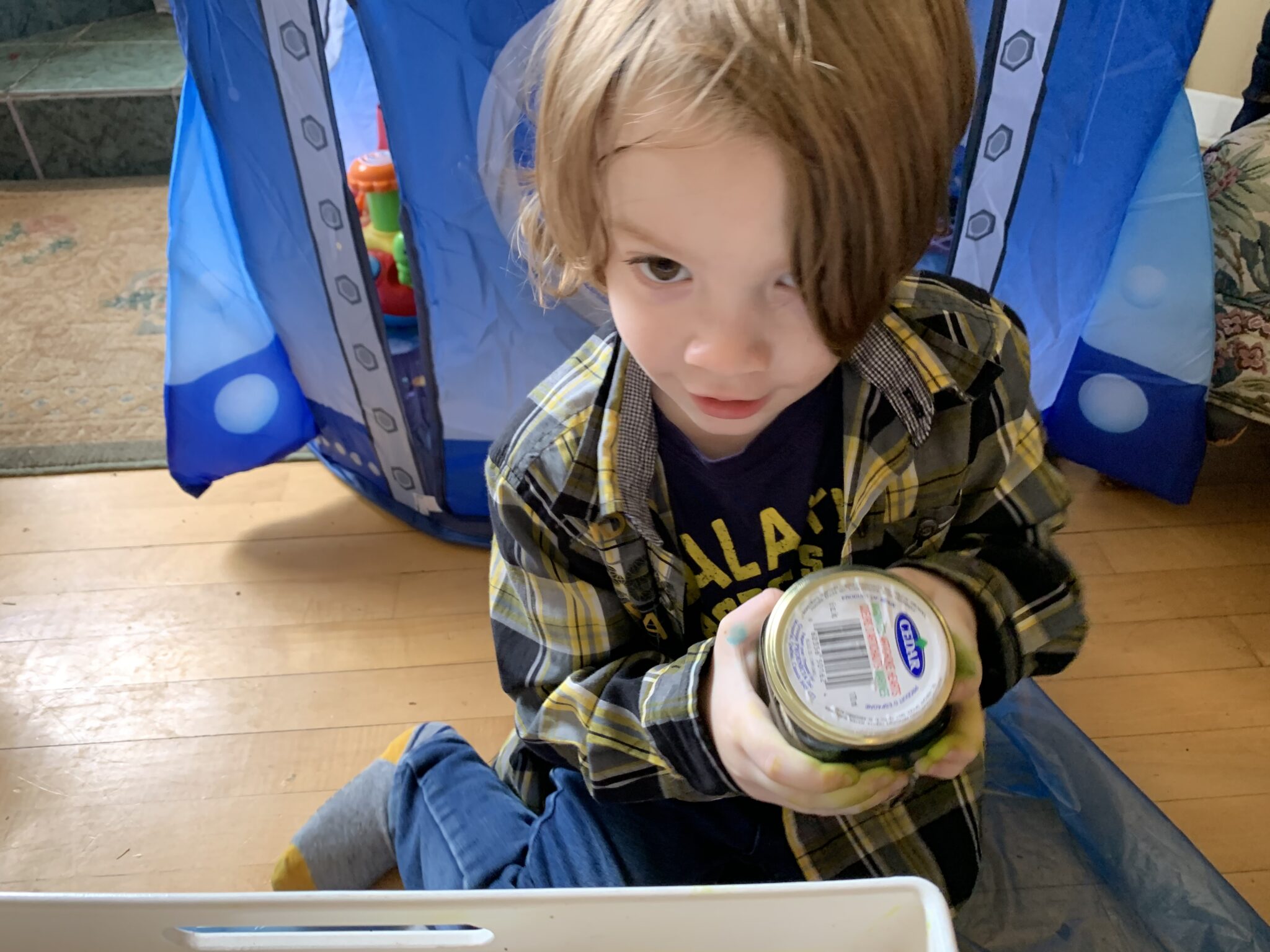 Have your kids shake food coloring and oil in little jars to mix it all up for your space experiment.